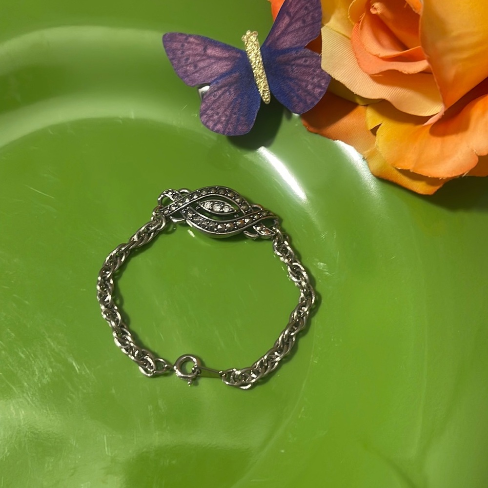 Avon silver swirl bracelet